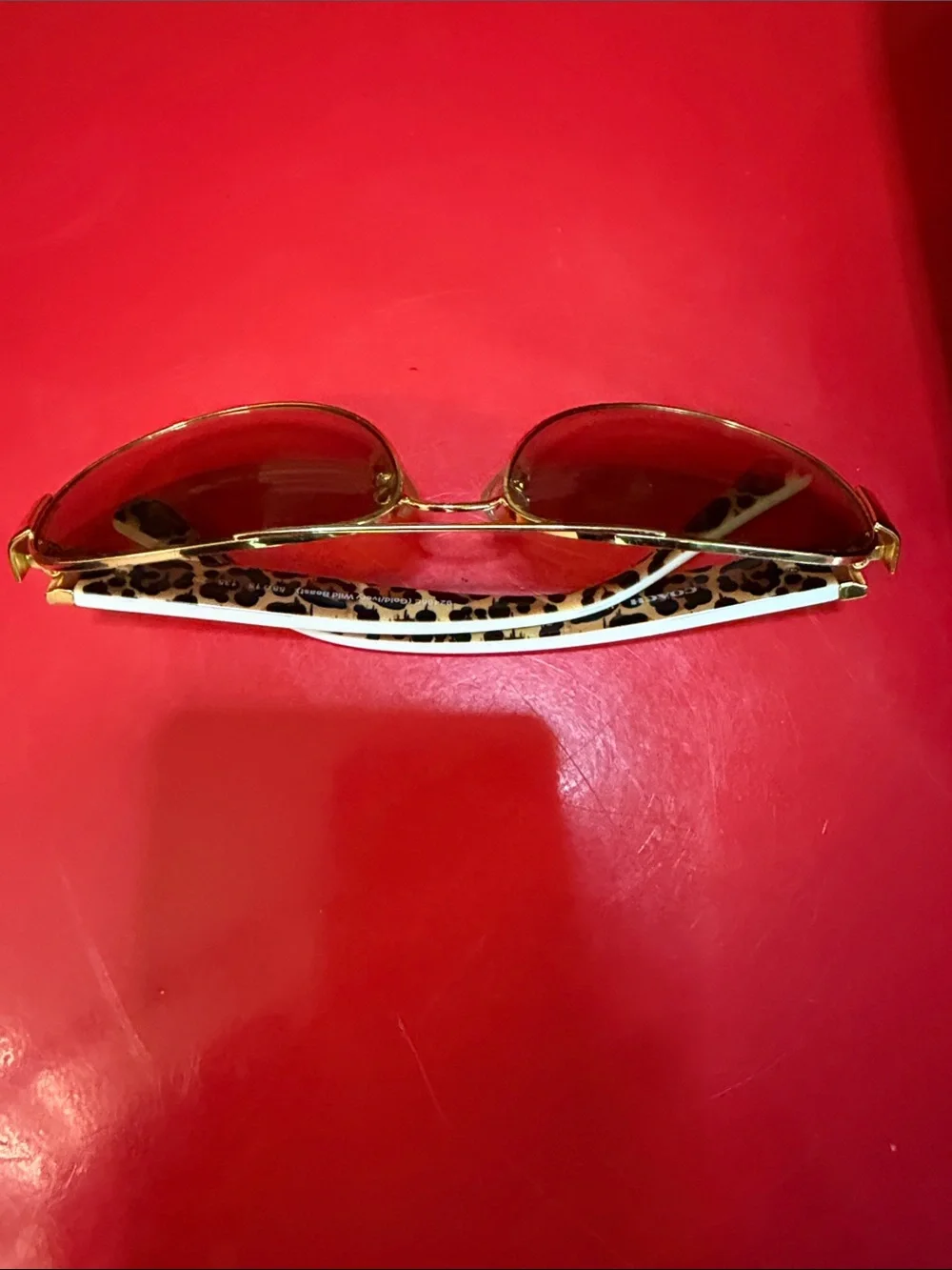 Coach Gold-Tone Aviator Sunglasses with White Temples